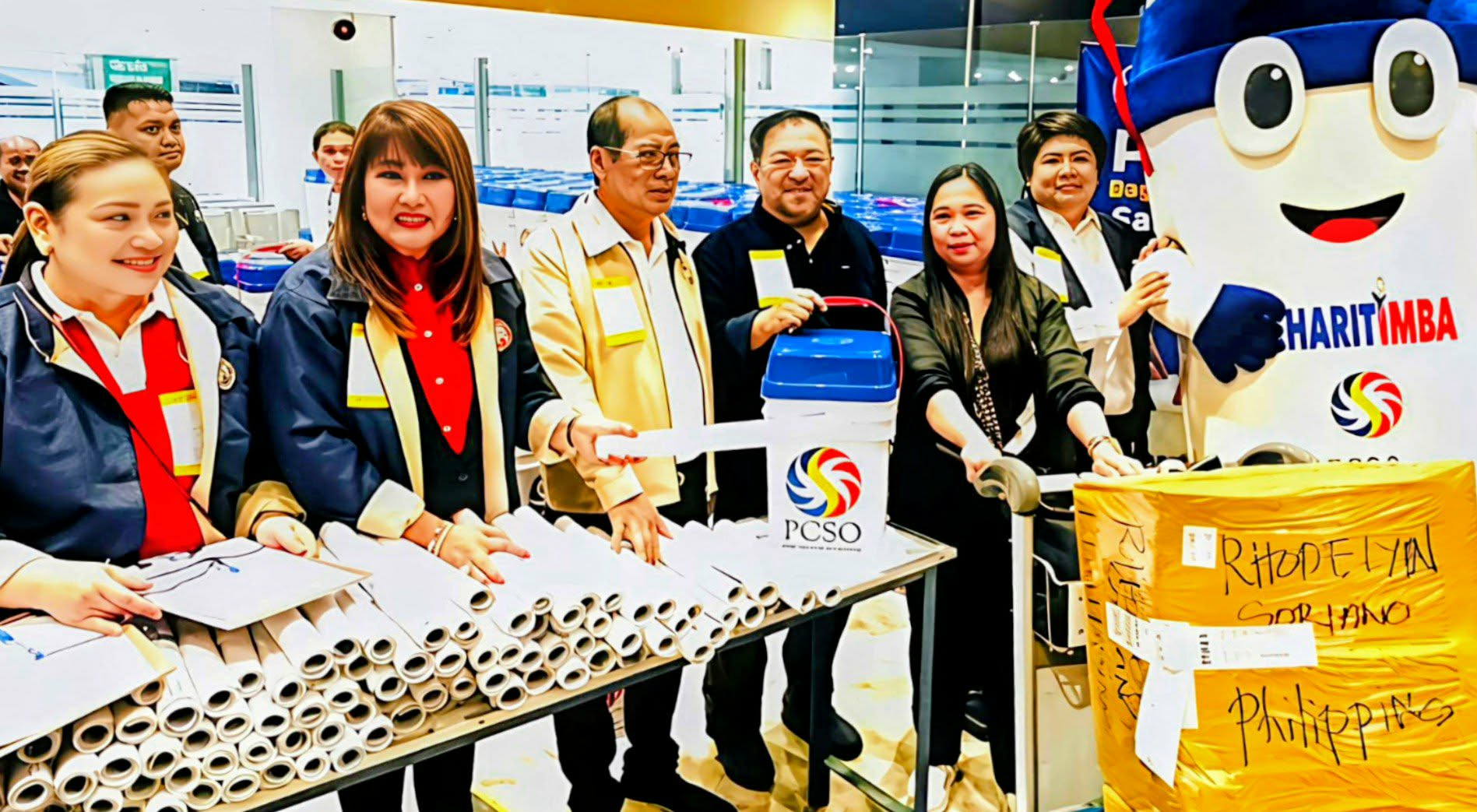 PCSO, OWWA Welcome Returning OFWs from Kuwait with “Charitimba” Gift